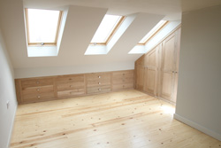 Loft conversion with oak fitted furniture